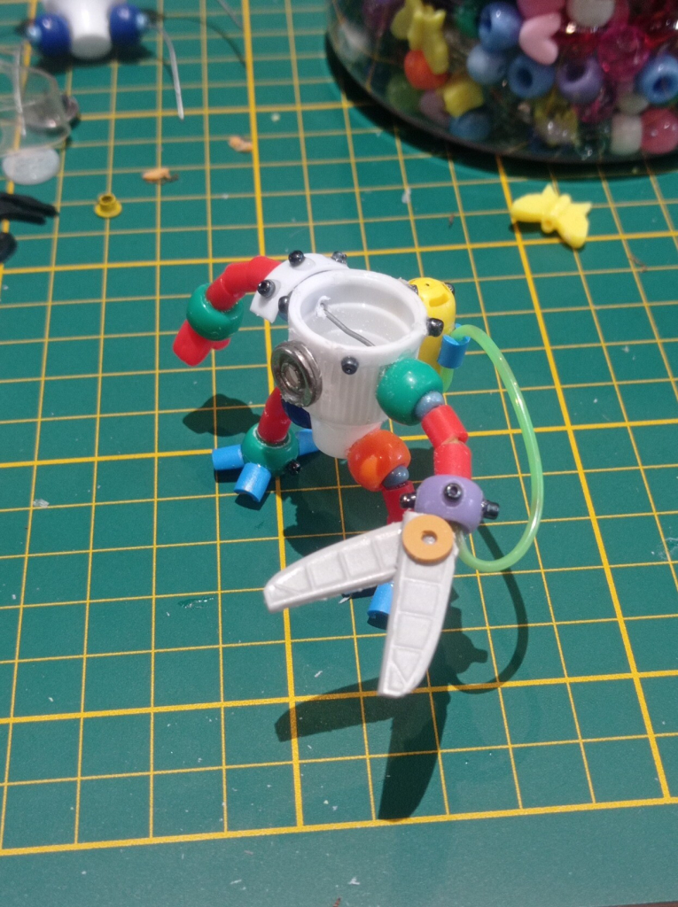 The beads were added on the robot to give a rivet effect