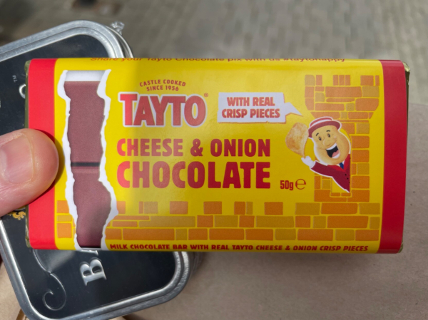 Photo of Tayto cheese and onion chocolate bar in my hand.