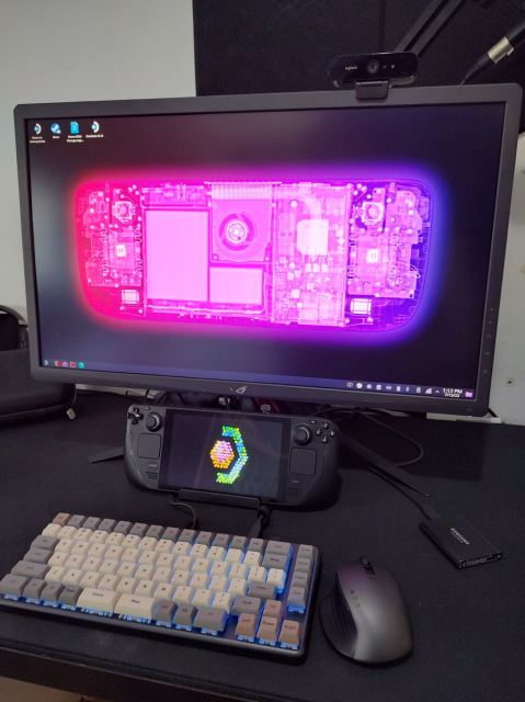 Steam Deck, docked with a 4K monitor, keyboard and peripherals. 