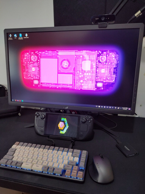 Steam Deck, docked with a 4K monitor, keyboard and peripherals. 