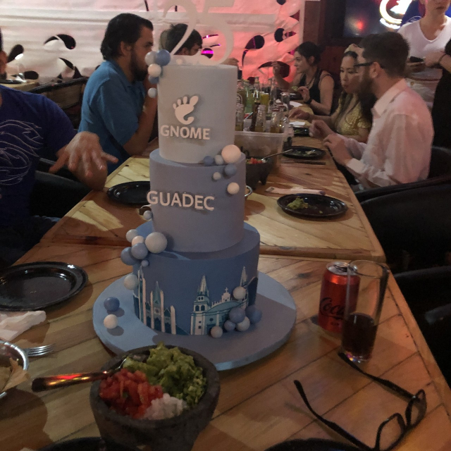 3-storey cake in GNOME blue fondant, adorned with Guadalajara's landmarks.