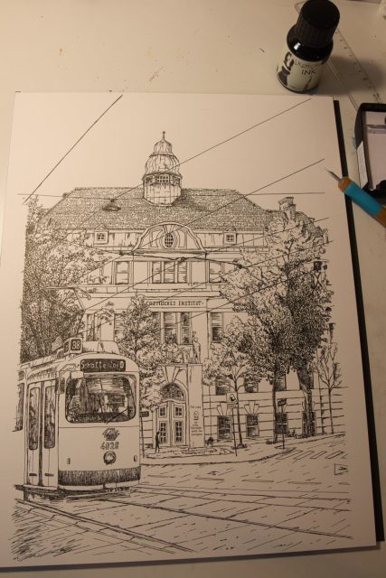 A black ink drawing on white paper showing a viennese tramway in front of a building with letters "Chemisches Institut" on it.