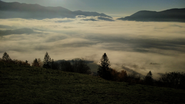 Photo of the Mala Fatra mountain range with low clouds from temperature inversion