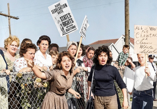 A crowd of angry anti-integration protesters 