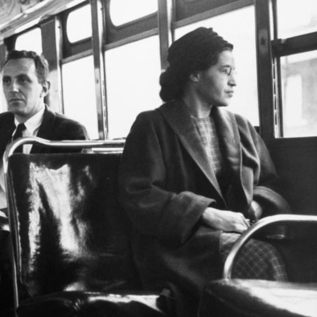 Rosa Parks sitting in the bus in 1955