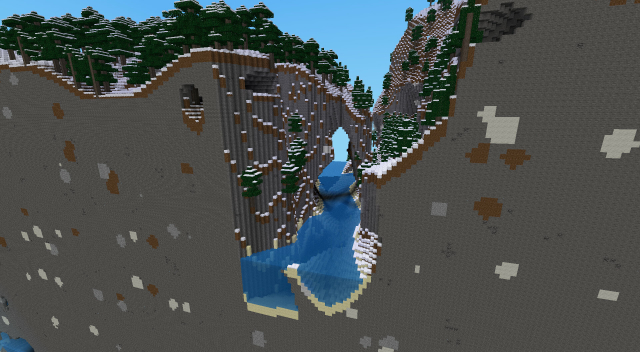 A screenshot of Minetest Game showing a cross-section of a snowy gorge surrounded by pine trees.