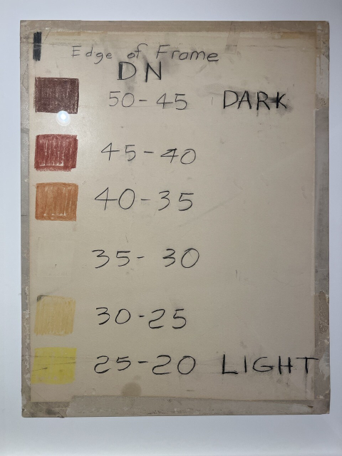 A legend for the pastel Mariner map. Labels, top to bottom, black vertical line labeled “Edge of Frame”, dark brown swatch , 50-45 DN ‘Dark’, umber swatch, 45-40 DN, orange swatch, 40-35 DN, white swatch, 35-30 DN, orange-yellow swatch, 30-25 DN, yellow swatch, 25-30 DN, ‘Light’.