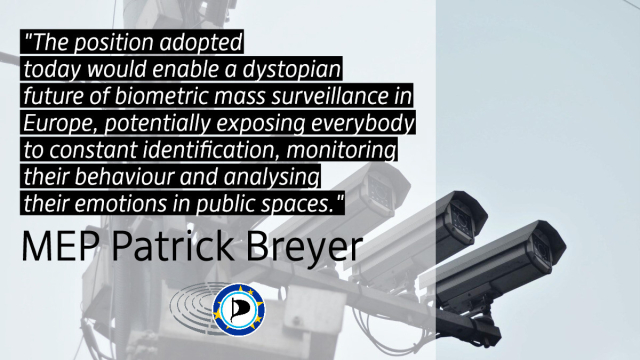 Text: “The position adopted today would enable a dystopian future of biometric mass surveillance in Europe, potentially exposing everybody to constant identification, monitoring their behaviour and analysing their emotions in public spaces.” MEP Patrick Breyer / Backround: Surveillance cameras