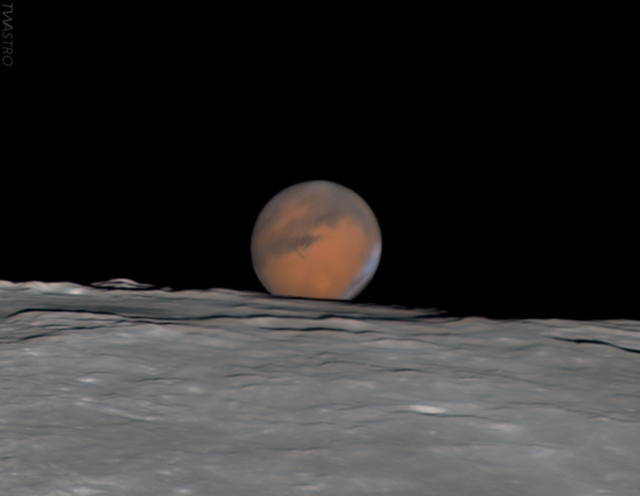 Mars just rising behind the Moon, as seen from Earth