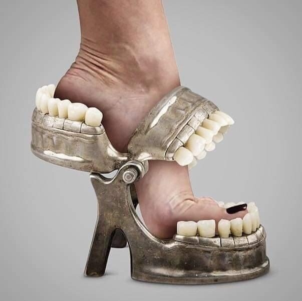 It's some high heels and there are a lot of teeth involved. Teeth on the toes, on the heel cup and also inexplicably on the ankle strap. The teeth on the strap and toes mimic an open mouth. It is horrendous. 