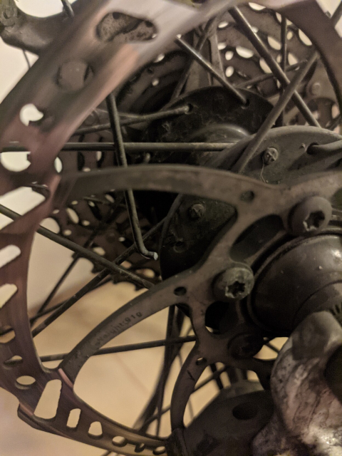 A broken bike wheel spike