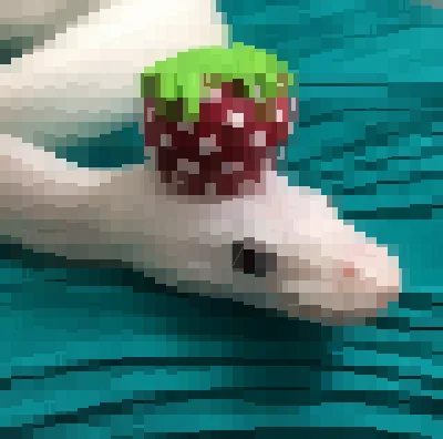 A white snake with a plush strawberry on its head, rendered to Unicode and terminal escape sequences.