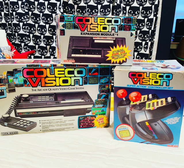 Rainbow ColecoVision logos on boxed ColecoVision set with expansion module #1 and the super action controller set