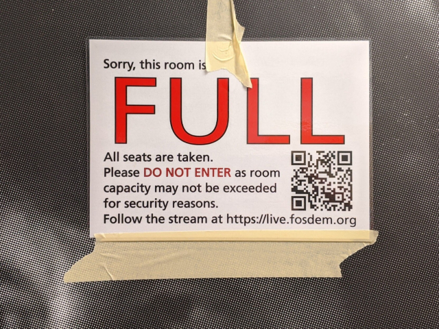 sign on a door that says "sorry, this room is full. all seats are taken. please DO NOT ENTER"