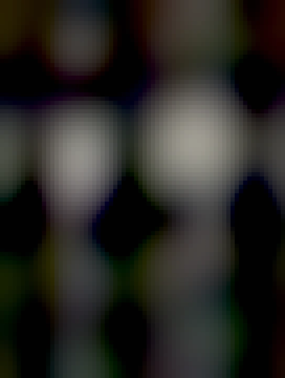 Two usb wall chargers connected by a single usb cable 