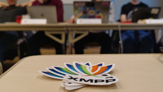 XMPP Stickers on a table at the XMPP Summit 25 in Brussels