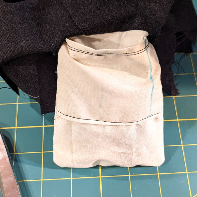 The pocket turned out, showing how the completed patch pocket sits against the main pocket.