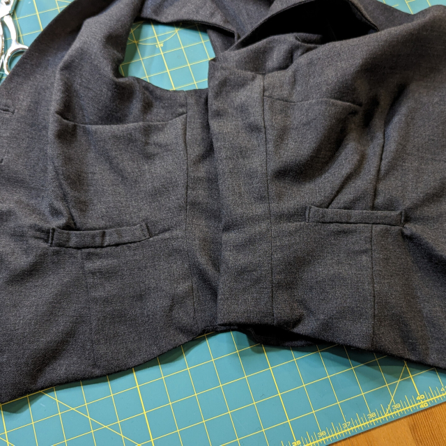 The side seams of an almost finished waistcoat