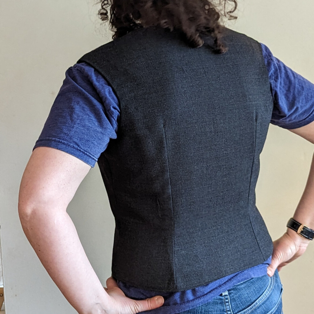 A grey waistcoat from the back