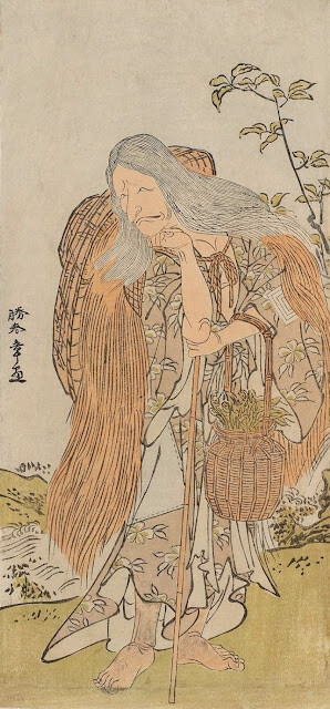 A ukiyo-e print if an old woman with grey hair. She holds a basket and walking stick.