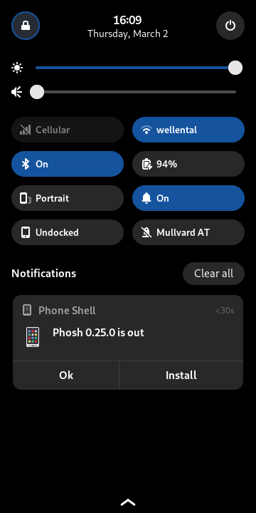 Phosh showing a notification saying "Phosh 0.25.0 is out"