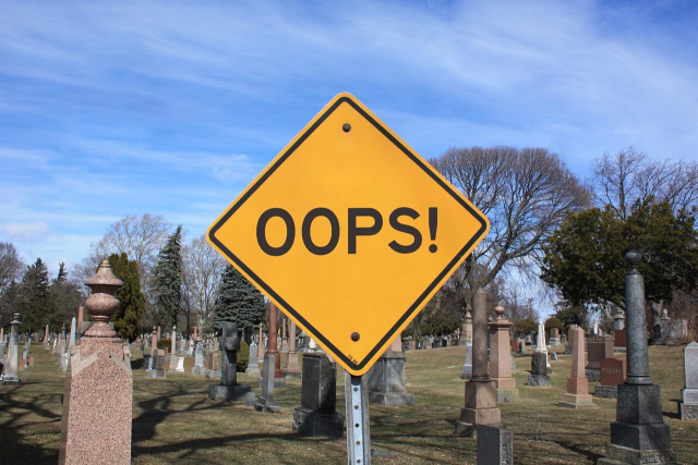 sign saying "oops"