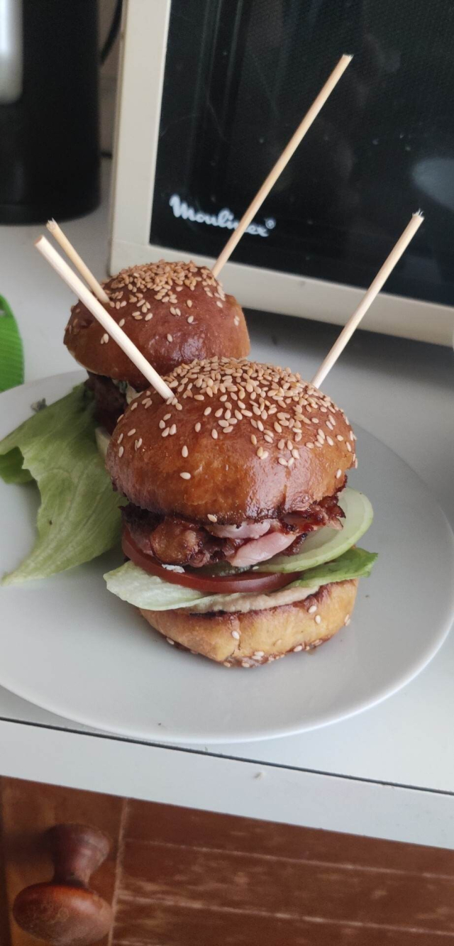 Two complete burgers on the plate