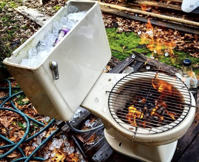 picture of an old toilet with the water tank being used as an ice bucket for beer and the toilet bowl used as a fire pit for a bbq