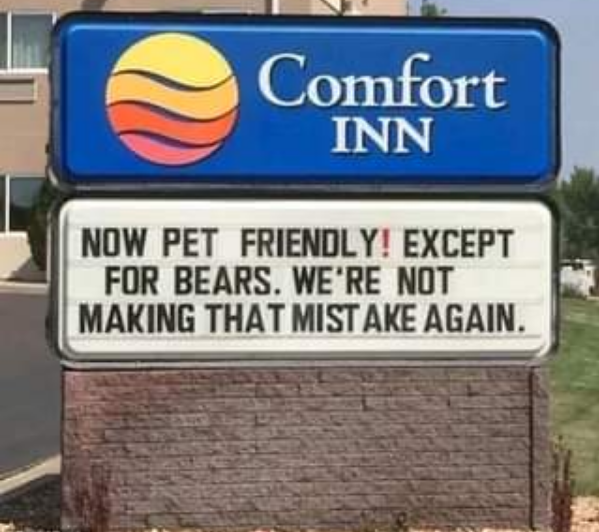 Hotel sign: Now pet friendly!  Except for bears, we're not making that mistake again.