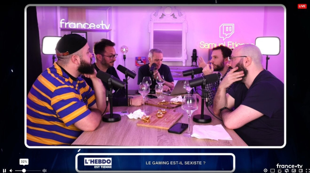 a screenshot of a twitch broadcast showing 5 white dudes sitting around a table discussing "is gaming sexist"