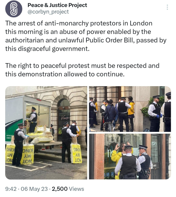 Tweet showing police arresting people in Central London. A vanload of placards reading "not my king" is being loaded or unloaded, it's not clear which 