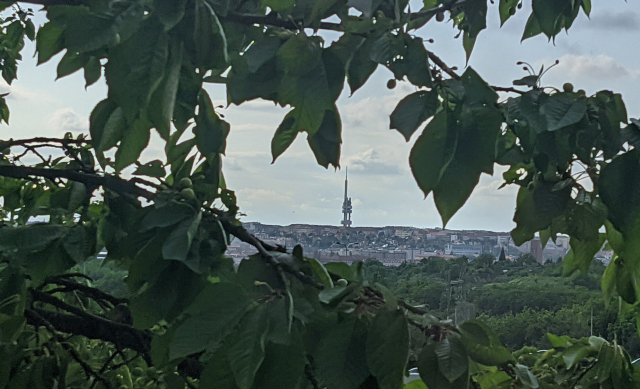 The Žižkov TV tower on the horizon of Prague