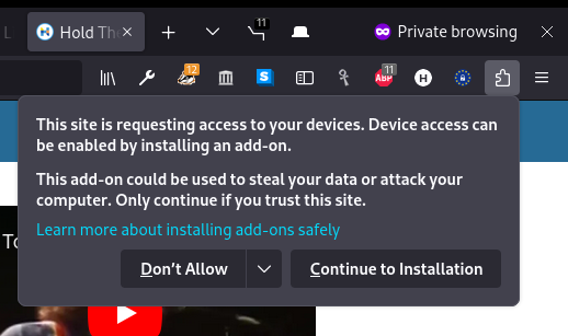 A Firefox popover telling the site is requesting to access devices (which one?) and that I need to install an add-on (which one?).