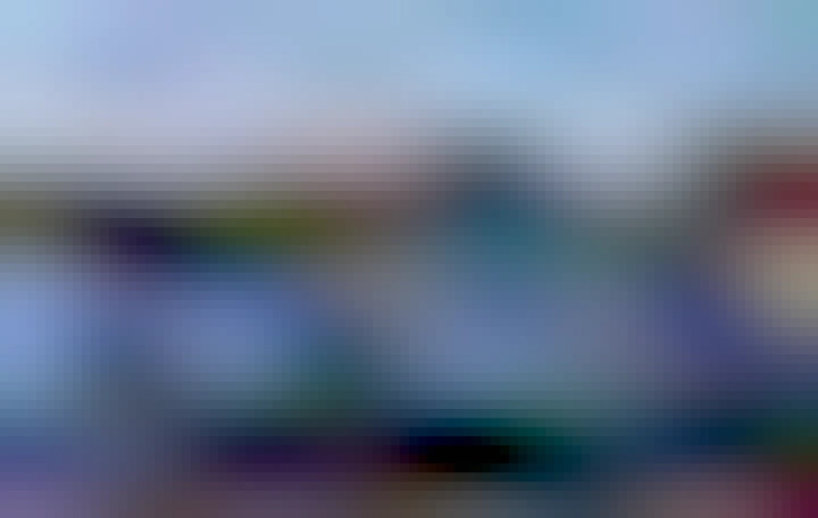 A stubby-looking 30-foot Grand River Transit bus