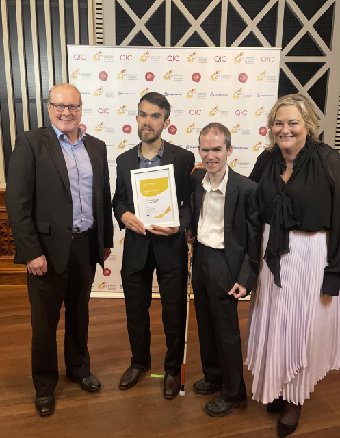 James Boreham (NV Access General Manager), Jamie Teh (NV Access founder and director), Mick Curran (NV Access Executive Director) and Kristin Devitt (KDPR Director) with the Philanthropy Innovation award at the QCF event.