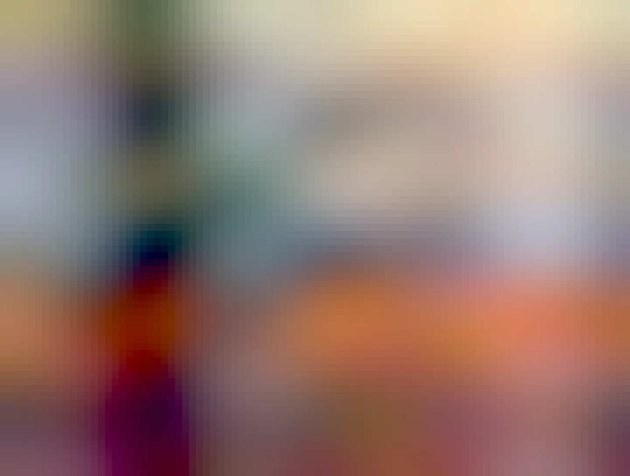 Side-by-side wheel tandem with small wheels fore and aft to prevent tipping