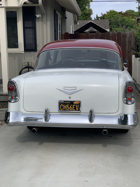 Photograph of a 1956 Chevrolet car with the license plate “CH56EV”