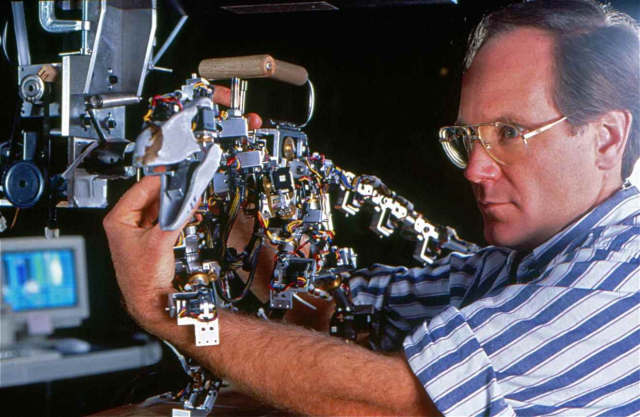 The Dinosaur Input Device (here with Tippett Studio animator Randy Dutra) would bridge a gap between stop-motion and CG animation
