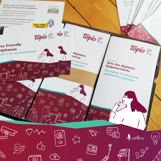 Eine Kiste mit Flyern von Topio.