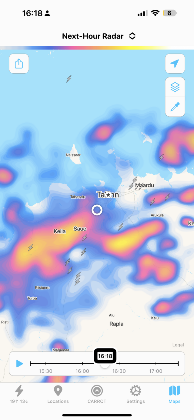 The screenshot of the weather radar app displays a map with several locations and precipitation information. The map's background has bodies of water in light blue and land in white. The locations labeled on the map are Keila, Saue, Tallinn, Maardu, Rapla, and Aegviidu. 

The precipitation is represented by different colors. The blue areas indicate light precipitation, while the red and orange areas indicate heavier precipitation. There is a large area of heavy precipitation in red and orange around Keila and Saue. There are also patches of lighter precipitation in blue scattered across the map.

There are three lightning bolt icons indicating thunderstorms. One is located just to the west of Keila, another is slightly to the northwest of Saue, and the third one is between Keila and Saue.

At the bottom of the screenshot, there is a timeline from 15:30 to 17:00 with a marker at 16:18, indicating the time of the radar image. The top right corner has icons likely for settings and sharing options.