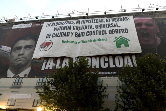 "Ni alquileres, ni hipotecas, ni deudas: vivienda gratuita, universal, de calidad y bajo control obrero.
Movimiento de vivienda de Madrid"