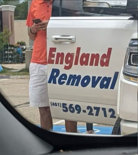 Photo of a van door opened in such a way that it says "England Removal"