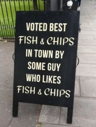 Chalkboard outside a fish and chip shop
"Voted best fish and chips in town by some guy who likes fish and chips"