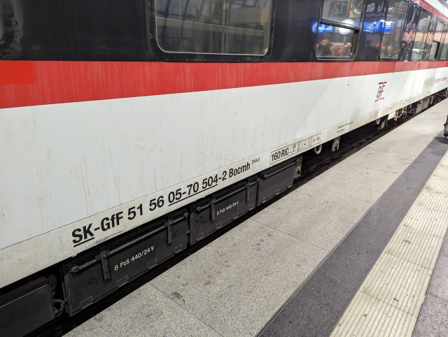 A side of a couchette car marked SK-GtF 51 56 05-70 504-2 Bocmh