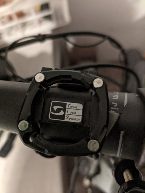 Empty cyclocomputer mount on bike handlebar