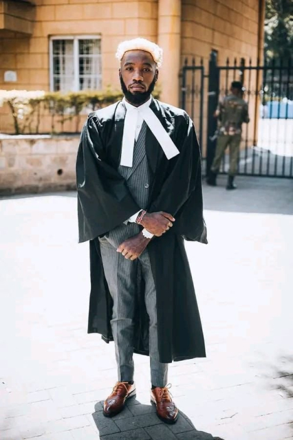 Fake lawyer, Brian Mwenda on his lawyer's gown 