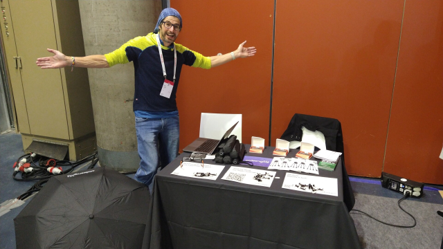 My colleague Chris behind our conference table full of goodies.