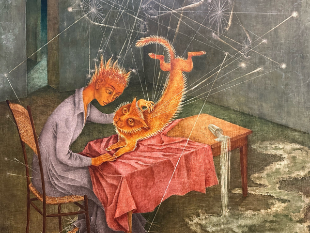 A cat with its butt flying into the air as a glass spills on the floor and sparks shoot occult symbols into the air. A human with flaming hair attempts to restrain it. Also by remedios varo