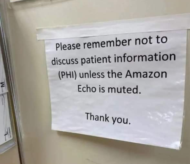 Sign in hospital reading: please remember not to discuss patient information (PHI) unless the Amazon Echo is muted.
