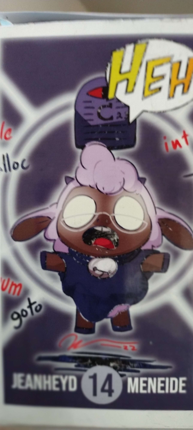 The non-transparent side of the rectangular box, showing art for C done by Miguel (https://art.mcyoung.xyz/). It shows a ThePhD's blog character -- a sheep -- suspended in the air, eyes completely whited out and glowing as they invoke the various powers of C.